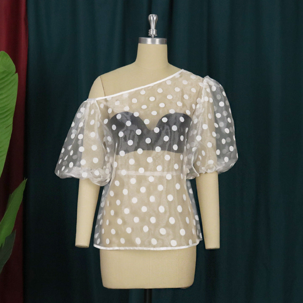 Damen Verspielte Bluse mit transparentem Polka-Punkten Design und Puffärmeln Echo Archiv