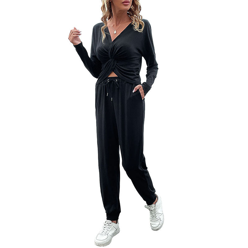 Damen Lässiger Zweiteiler mit Twist‑Top und Bundfalten‑Jogger Echoarchiv