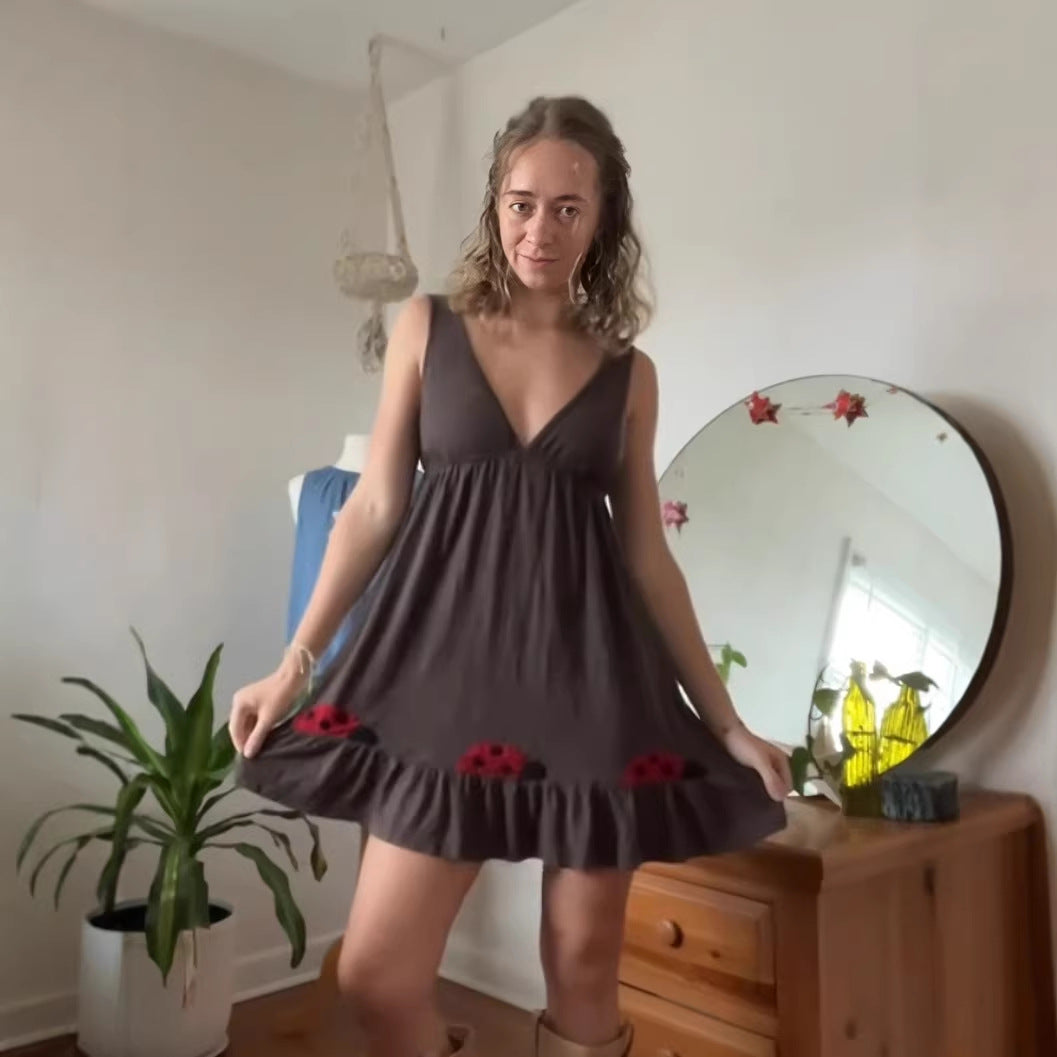 Damen nan ärmelloses Minikleid mit tiefem V‑Ausschnitt Unterbrustnaht und Volantsaum mit Marienkäfer‑Applikation Echo Archiv
