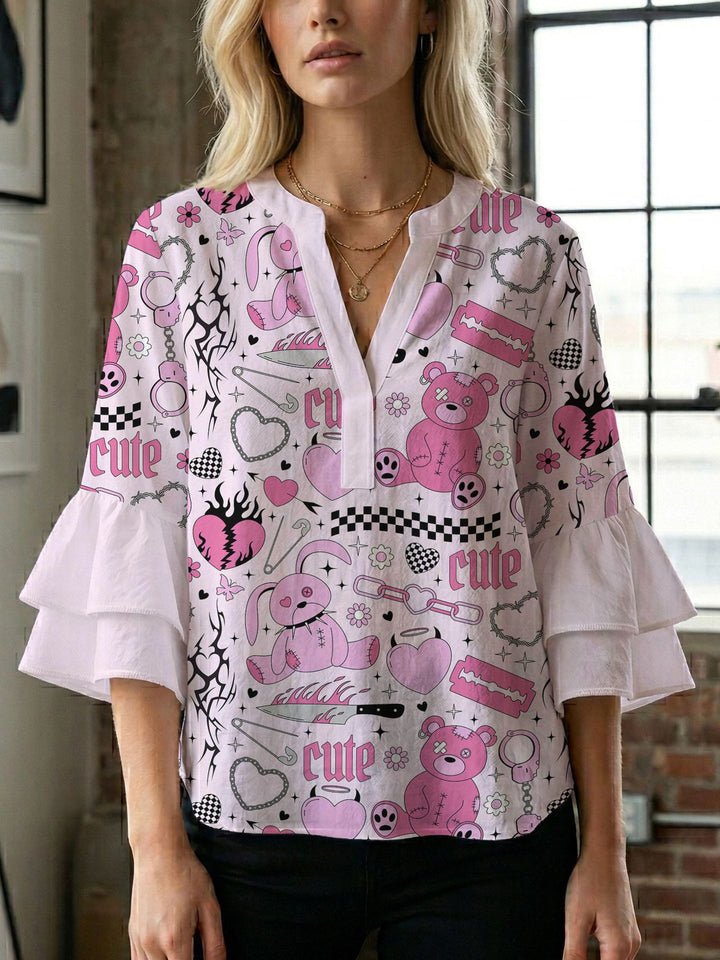 Damen Blusenshirt mit voluminösen Ärmeln und kreativem Druckdesign Echo Archiv