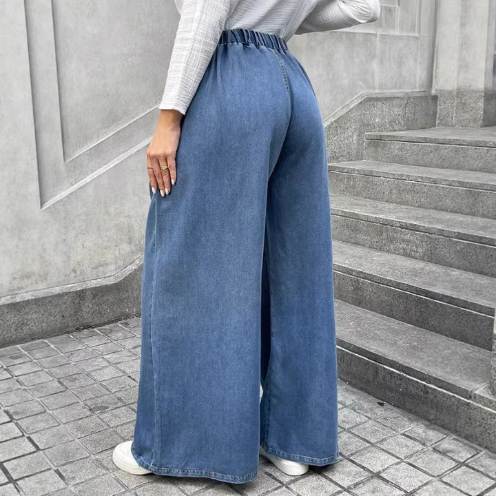 Damen Relaxte Palazzohose aus Denim mit Tunnelzugbund, Eingrifftaschen und extra weitem Bein Echo Archiv