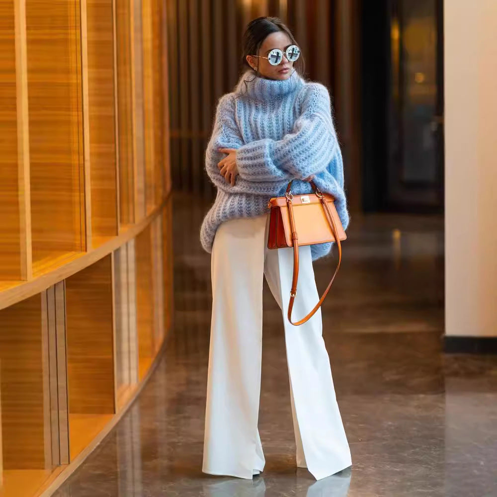 Damen Oversized Grobstrick-Rollkragenpullover mit voluminösen Ärmeln Echoarchiv