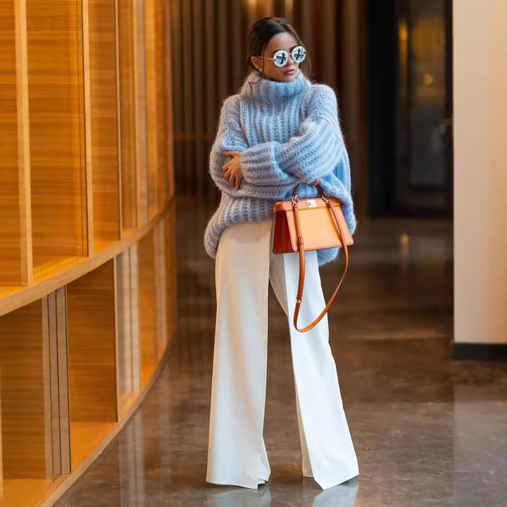 Damen Oversized Grobstrick-Rollkragenpullover mit voluminösen Ärmeln Echoarchiv