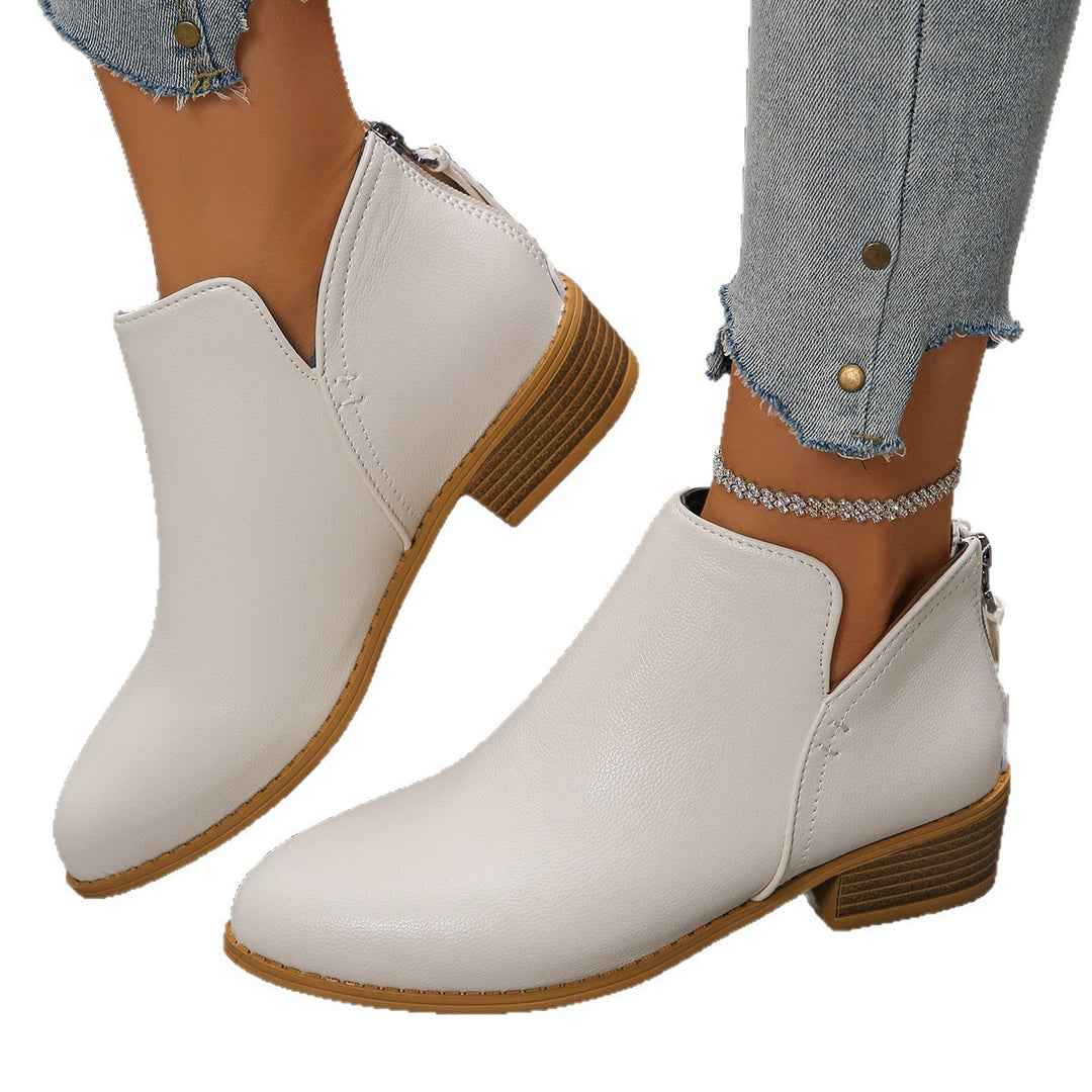 Damen Kurzstiefel mit Fersenreißverschluss, seitlichem Cut-Out und niedrigem Blockabsatz – Varelle