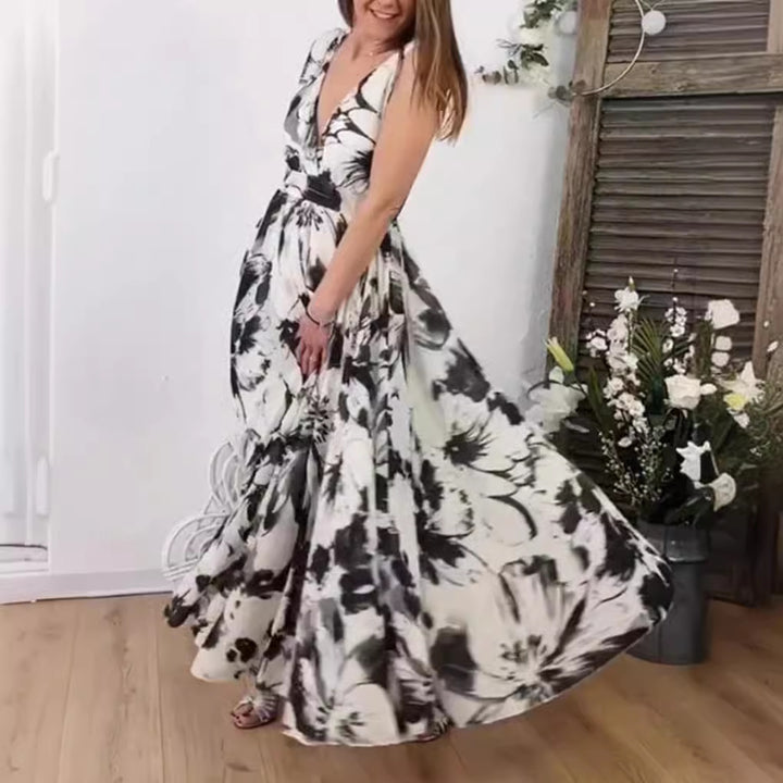 Damen nan voluminöses A-Linien Maxikleid mit tiefem V-Ausschnitt, taillierter Bindeschärpe und großfloralem Pinselprint Echo Archiv