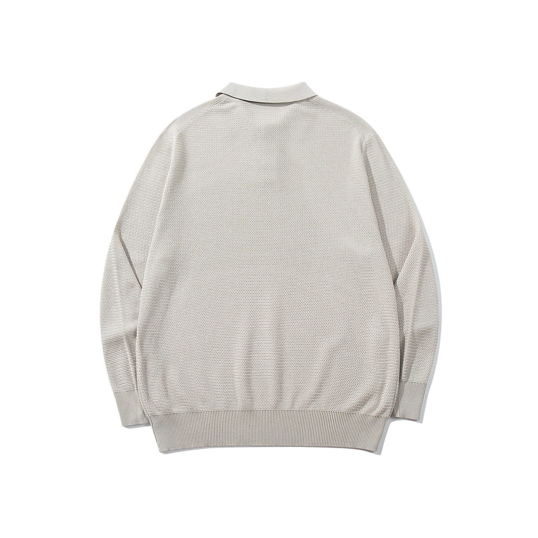 Unisex Waffelstrick-Polo im Relaxed-Fit mit dreifacher Knopfleiste und geripptem Saum Echoarchiv