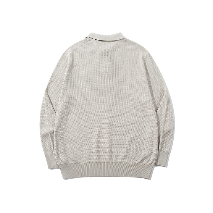 Unisex Waffelstrick-Polo im Relaxed-Fit mit dreifacher Knopfleiste und geripptem Saum Echoarchiv