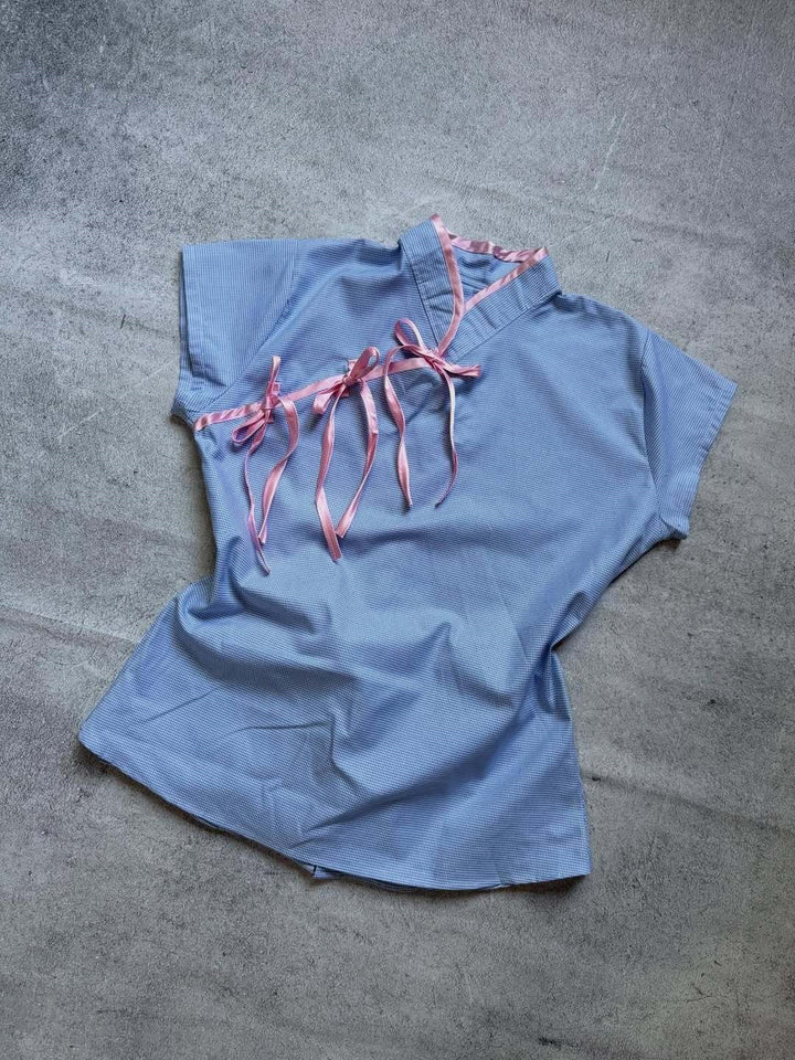 Damen Urbanes Karo-Top mit raffinierten Rüschendetails Echo Archiv