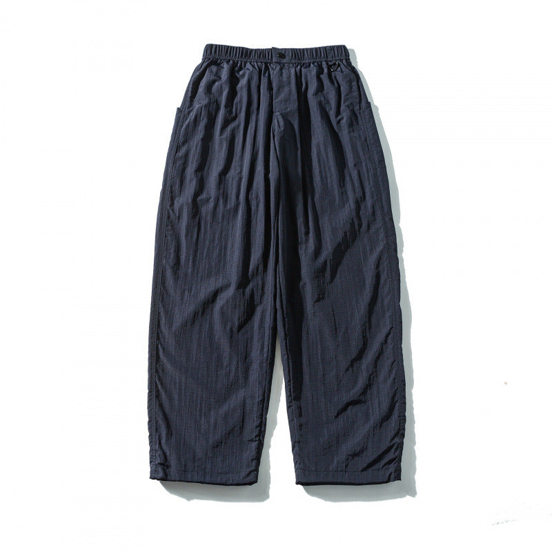Unisex Weite Crinkle-Hose mit elastischem Tunnelzugbund, tiefem Schritt und Seitentaschen Echo Archiv