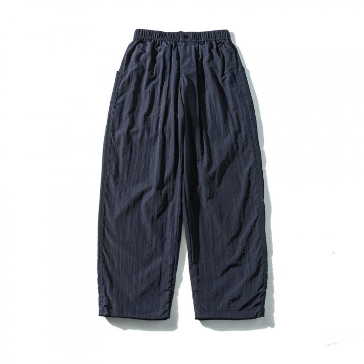 Unisex Weite Crinkle-Hose mit elastischem Tunnelzugbund, tiefem Schritt und Seitentaschen Echo Archiv