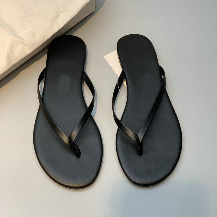 Damen stilvolle Flip-Flops mit glänzendem Riemendesign Echoarchiv