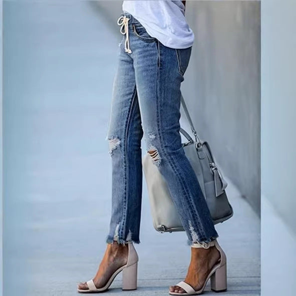 Damen Cropped-Denim-Jeans mit Tunnelzugbund, Destroyed-Kniepartien und rohem Saum Echo Archiv