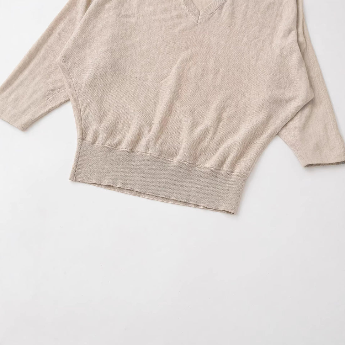 Damen Oversized V-Ausschnitt Feinstrickpullover mit Fledermausärmeln Echoarchiv