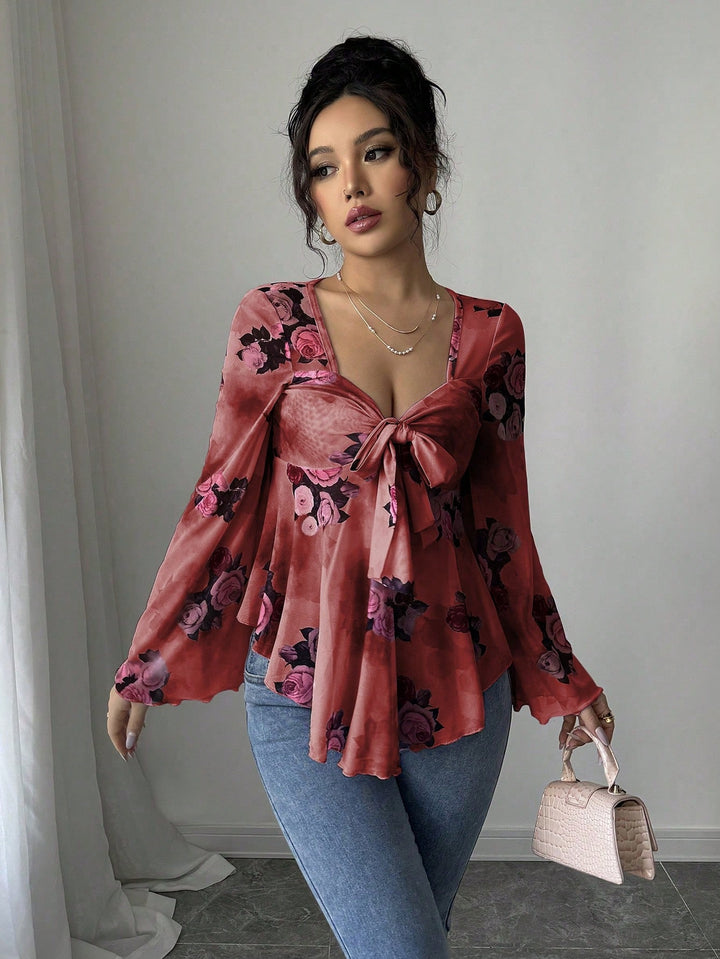 Damen Transparente Chiffon-Babydoll-Bluse mit Knotenfront und floralem Allover-Print Echo Archiv