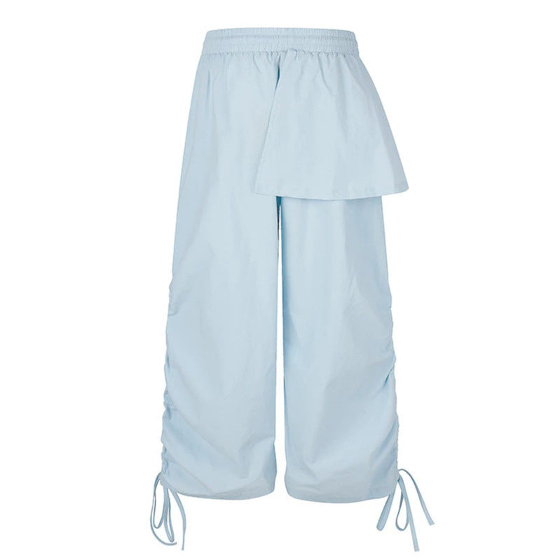 Damen Weite Capri-Hose mit Tunnelzug, seitlicher Raffung und asymmetrischer Überlagerung Echoarchiv