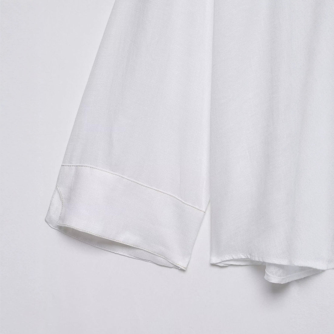 Damen Weites Tunika-Blusenshirt mit V‑Ausschnitt und halber Knopfleiste Echo Archiv