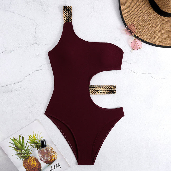 Damen Einteiliger Badeanzug mit asymmetrischem Cut-Out und modischen Kettenakzenten Echo Archiv