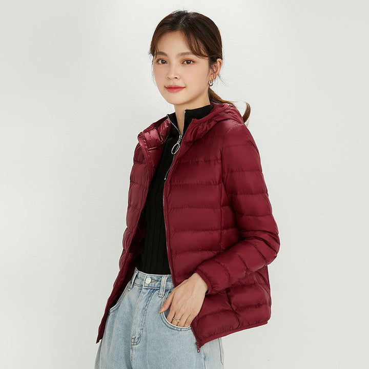 Damen Ultraleichte gesteppte Kapuzenjacke mit ultraflacher Thermowatte Echoarchiv