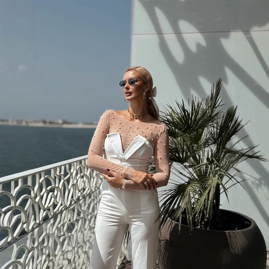 Damen eleganter Jumpsuit mit transparenten Ärmeln und Perlenverzierung Echo Archiv