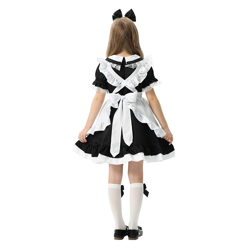 Mädchen verspieltes Dienstmädchenkleid mit Rüschendetails Echo Archiv