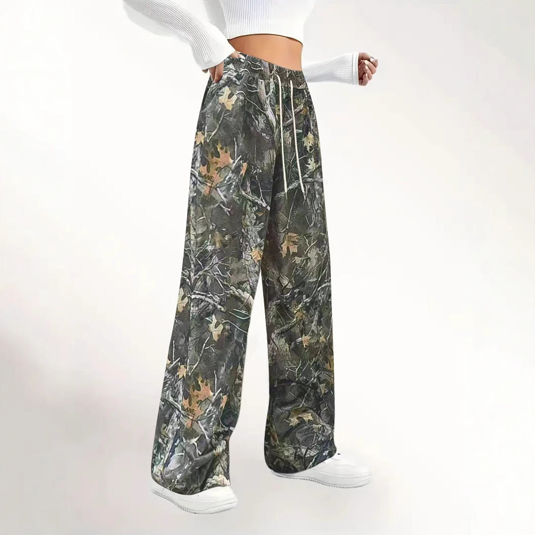 Damen Weite Palazzo-Loungehose im Camouflage-Blattmuster mit Elastikbund, Tunnelzug und Eingrifftaschen Echoarchiv