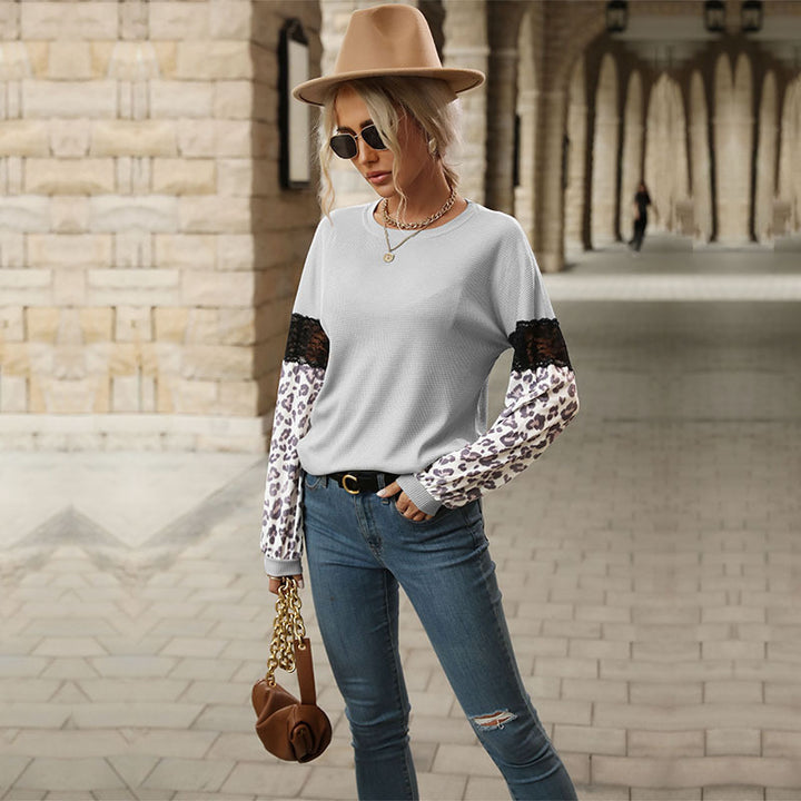 Damen Langarmshirt mit Leopardenärmeln und Spitzenbesatz Echoarchiv