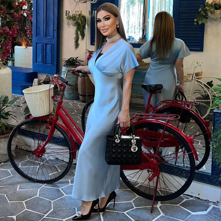 Damen Maxikleid mit elegantem Wickeloberteil und fließendem Saum Echo Archiv