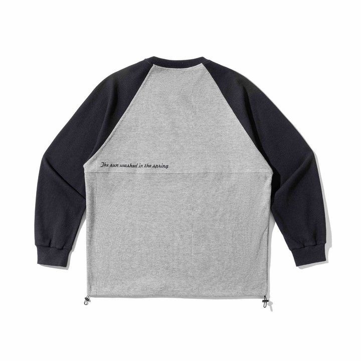 Unisex Raglan‑Sweatshirt mit Thermowaffelstruktur, Kordelzugsaum und dezenter Bruststickerei Echoarchiv