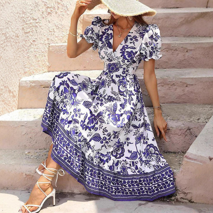 Damen nan tailliertes Boho-Maxikleid mit Wickeloptik V-Ausschnitt Puffärmeln und Bordüren-Stufenrock Echo Archiv