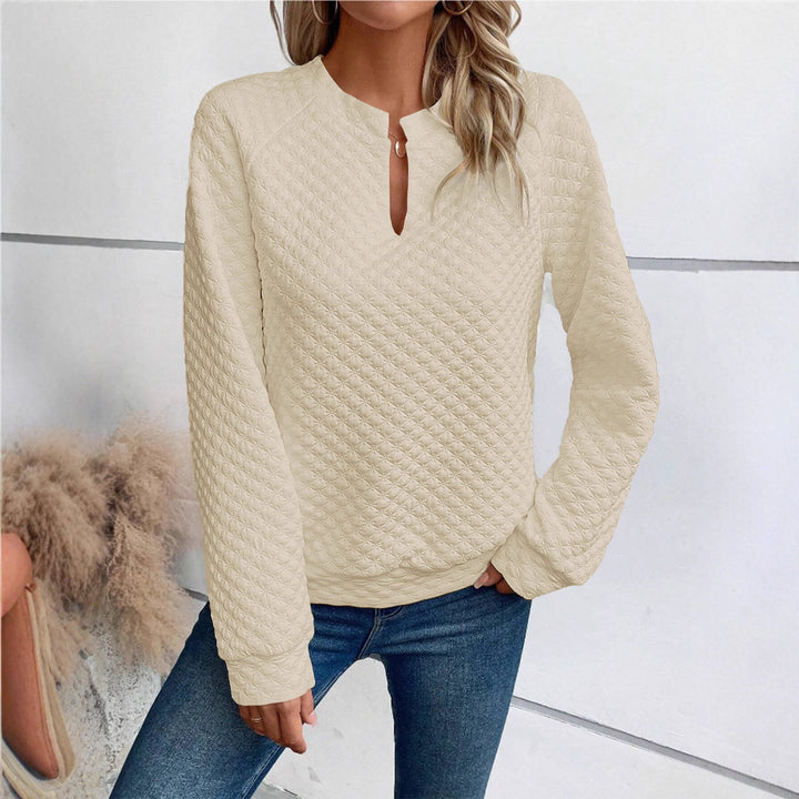 Damen Gestepptes Sweatshirt mit Schlitzkragen, Rautenstruktur und Raglanärmeln – Mavelle