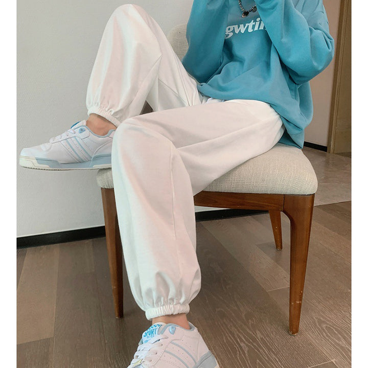 Damen relaxed-fit Sweatpants mit elastischem Kordelbund, seitlichen Eingriffstaschen und abgesteppten Saumnähten – Avélisse