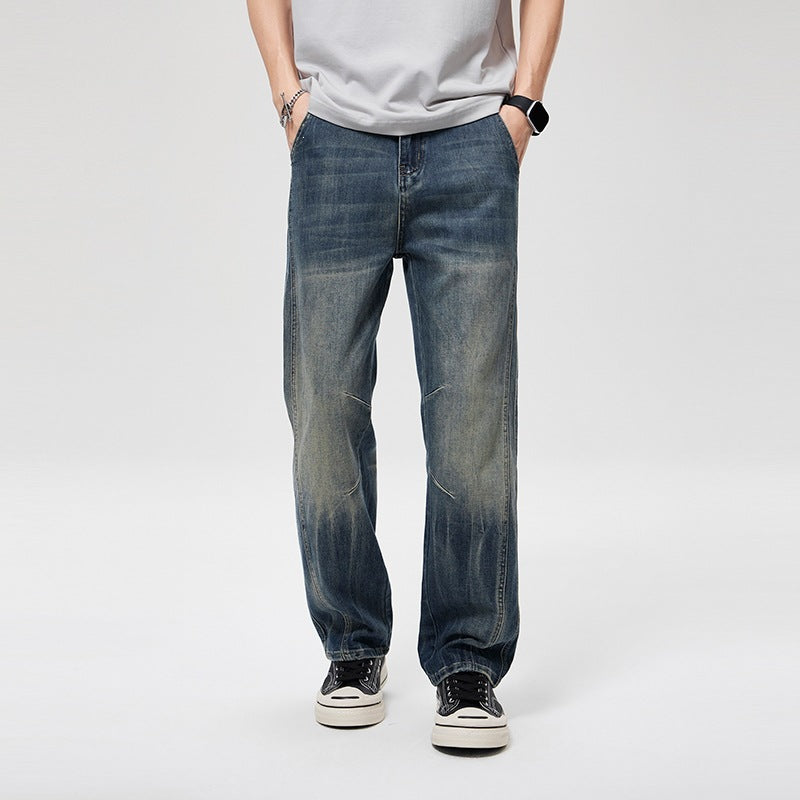 Herren Weite Baggy-Jeans im Vintage‑Wash mit Knie‑Detail Echoarchiv