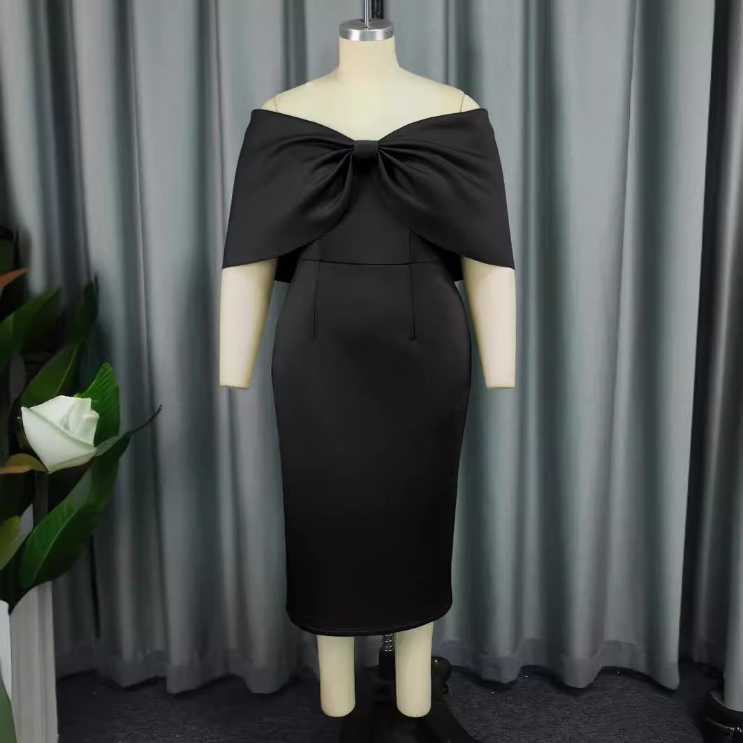 Damen figurbetontes Abendkleid mit abnehmbarem Tüllüberwurf und Schleifen-Detail Echo Archiv