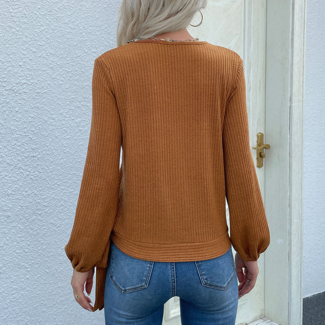 Damen Gerippte Wickel-Strickjacke mit V‑Ausschnitt, asymmetrischer Knopfleiste und Taillenband Echoarchiv