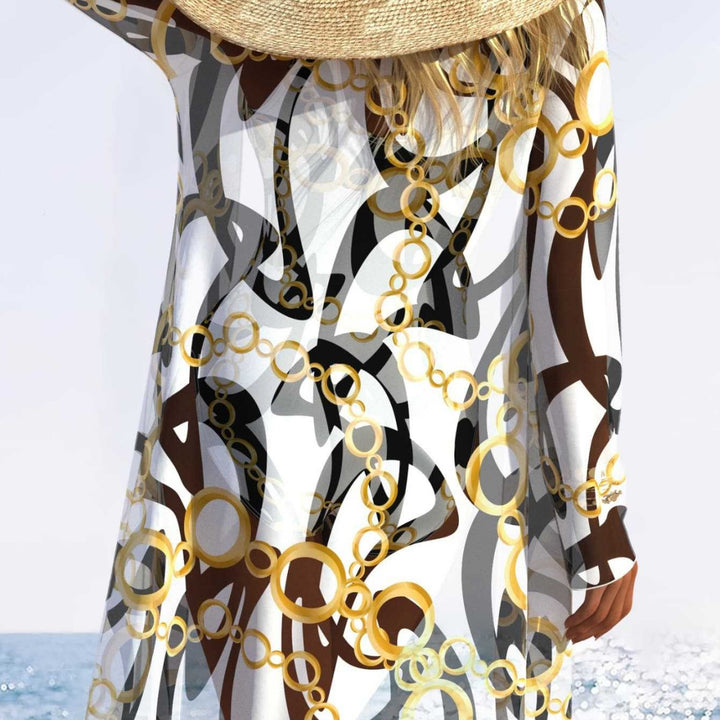 Damen eleganter Einteiler Badeanzug mit transparentem Überwurf und modernem Ringdesign Echo Archiv