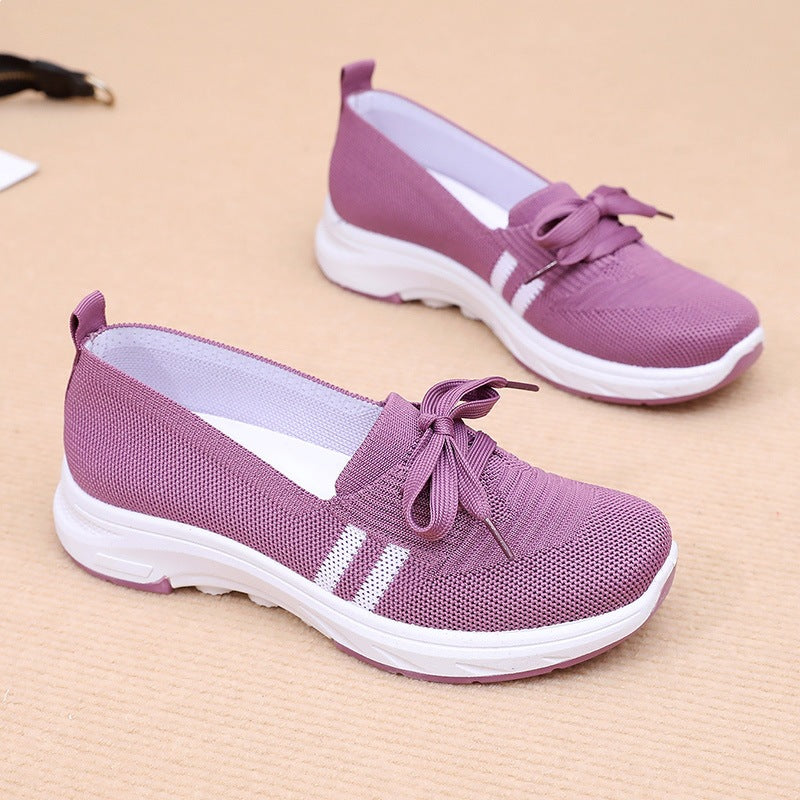 Damen Schlupf-Strick-Sneaker mit dekorativer Schleife und gedämpfter Plateausohle – Névara