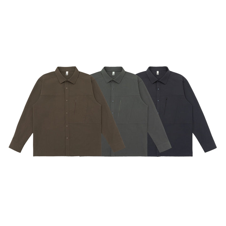 Unisex Oversize-Hemdjacke im Utility‑Style mit verdeckter Druckknopfleiste und diagonaler Reißverschlusstasche Echoarchiv