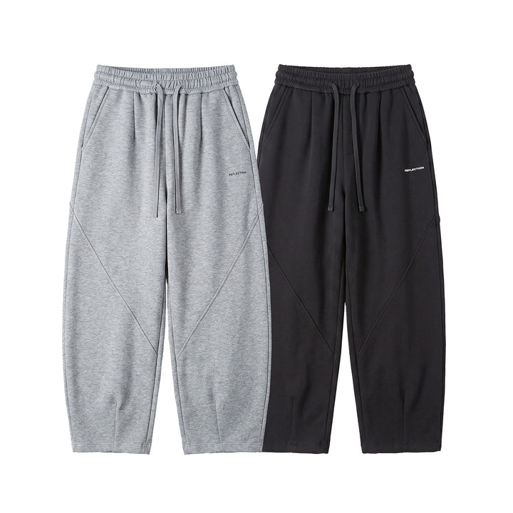 Herren Locker geschnittene Jogginghose mit Tunnelzug, Zierrnähten und Eingrifftaschen Echoarchiv