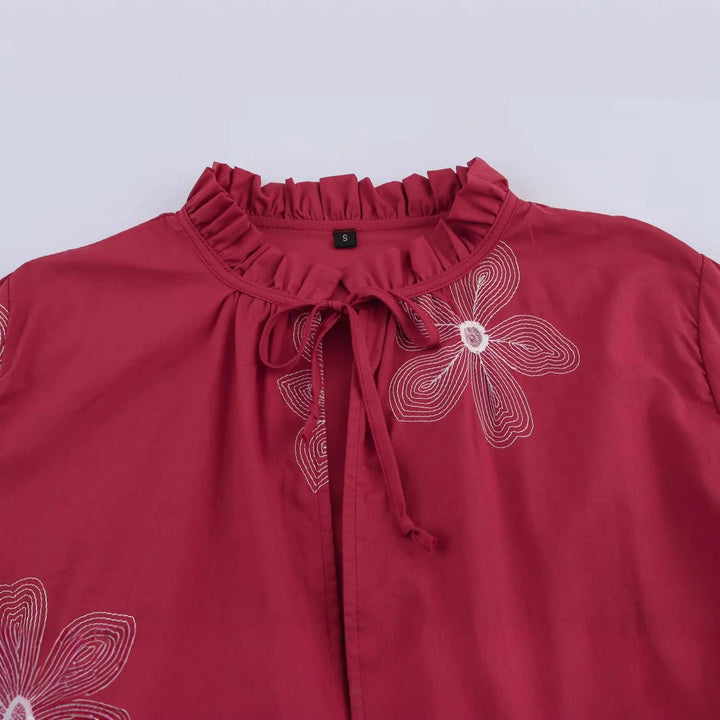 Damen bestickte lockere Hemdbluse mit Volantkragen, Bindebandvorderseite und Ballonärmeln – Élovi