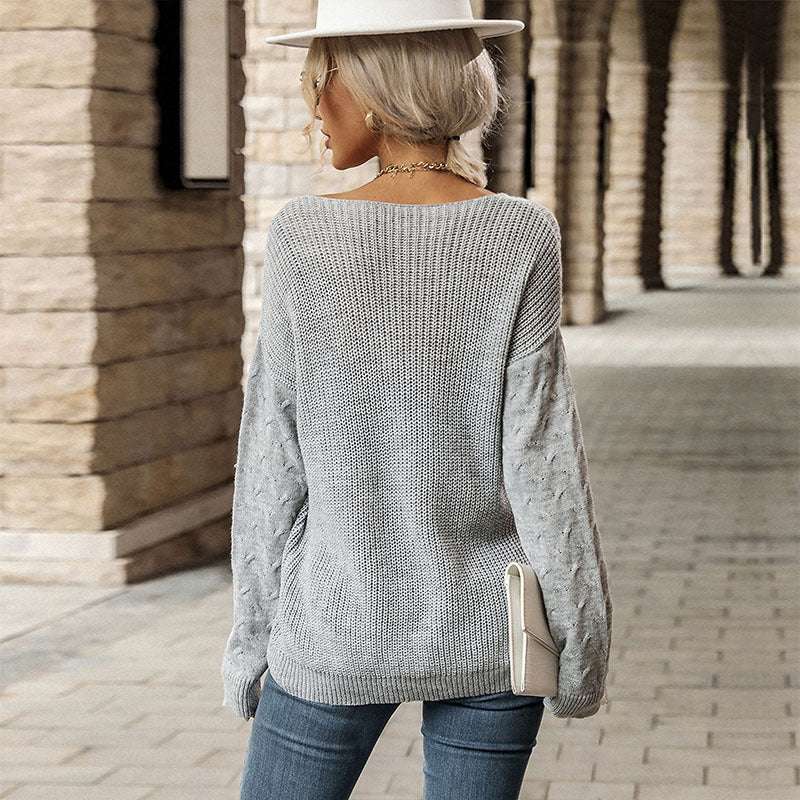 Damen Feiner V‑Ausschnitt Strickpullover mit mittigem Zopfdetail und legerer Silhouette Echoarchiv