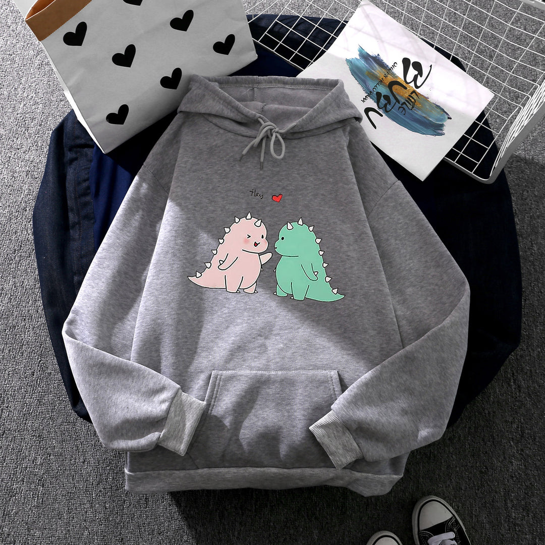 Damen Kapuzenpullover mit niedlicher Dinosaurierpärchen‑Illustration, Oversize‑Schnitt und Kängurutasche – Auréline