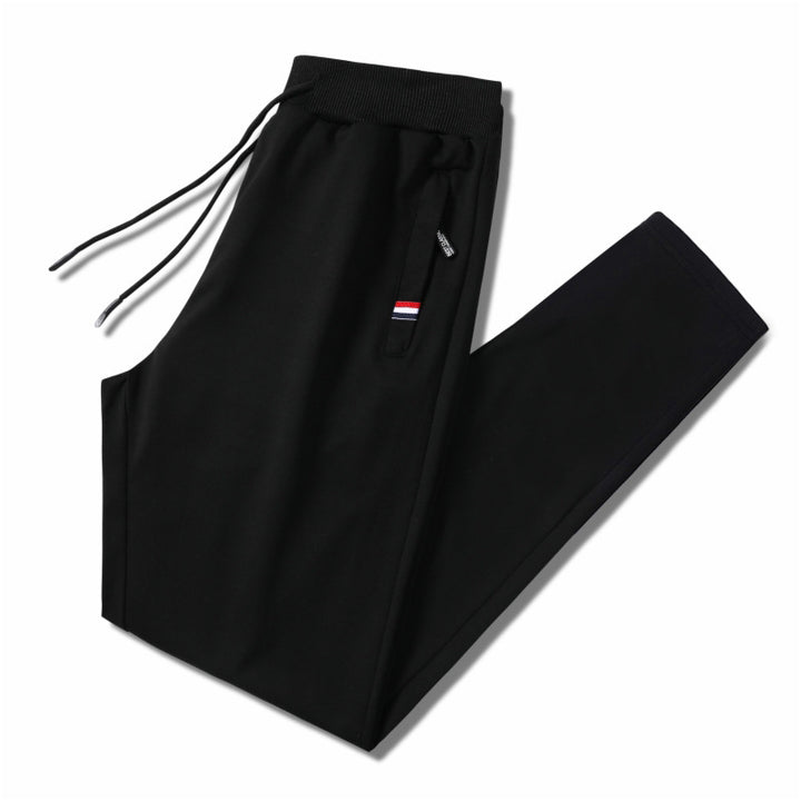 Herren Slim-Fit Jogginghose mit elastischem Rippbund, Kordelzug und Reißverschlusstaschen Echo Archiv