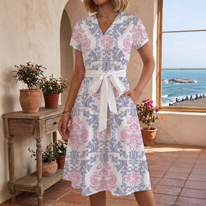 Damen Sommerliches Kleid mit taillierbarem Bindegürtel und floralem Muster Echo Archiv