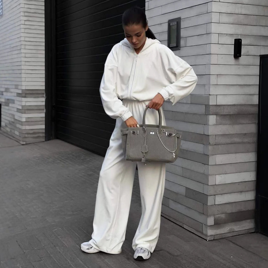 Damen Kapuzen-Jumpsuit mit weitem Bein elastischer Taille und Frontreißverschluss – Solévia