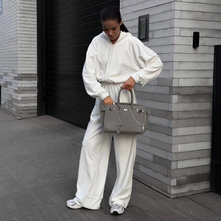 Damen Kapuzen-Jumpsuit mit weitem Bein elastischer Taille und Frontreißverschluss – Solévia