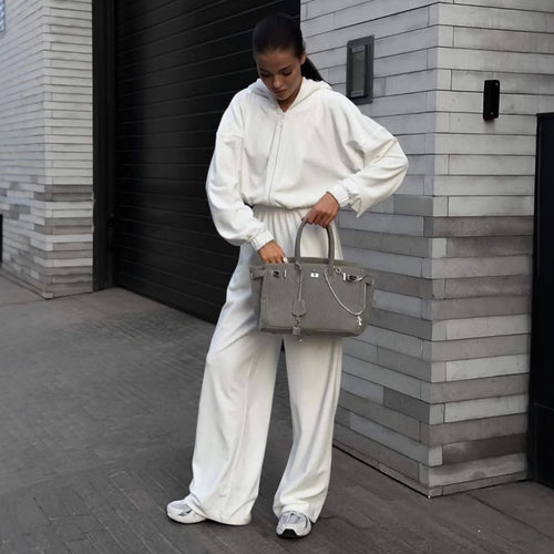 Damen Kapuzen-Jumpsuit mit weitem Bein elastischer Taille und Frontreißverschluss – Solévia
