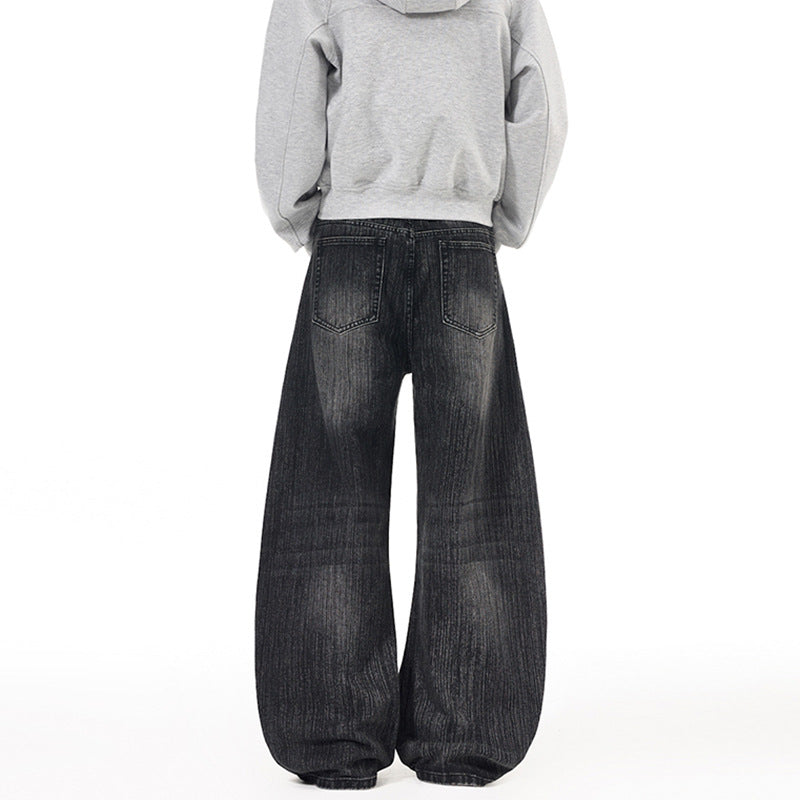 Herren Weite Vintage-inspirierte Denim‑Palazzohose mit verlängerter Saumlage und soften Bleach‑Effekten Echo Archiv