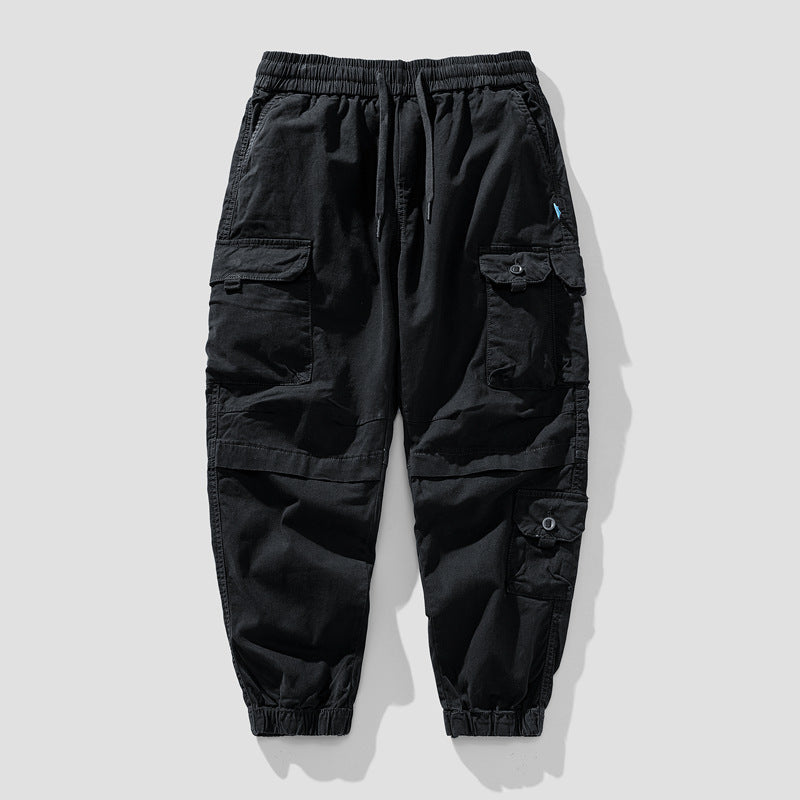 Herren Leichte Canvas-Cargohose im Joggerstil mit elastischem Bund, segmentierten Kniepaneelen und verdeckten Klappentaschen Echo Archiv