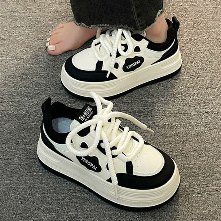 Damen Sportliche Sneaker mit atmungsaktiver Oberflächenstruktur und dämpfendem Profil Echo Archiv