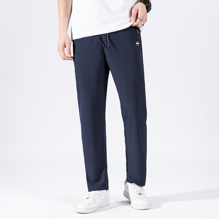 Herren Sportliche Jogginghose mit elastischem Bund und Seitentaschen Echo Archiv